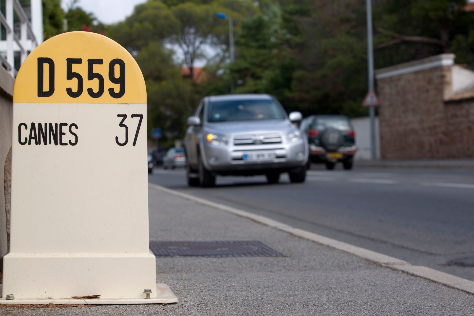 singposting to Cannes along a road at the Cote d'Azur